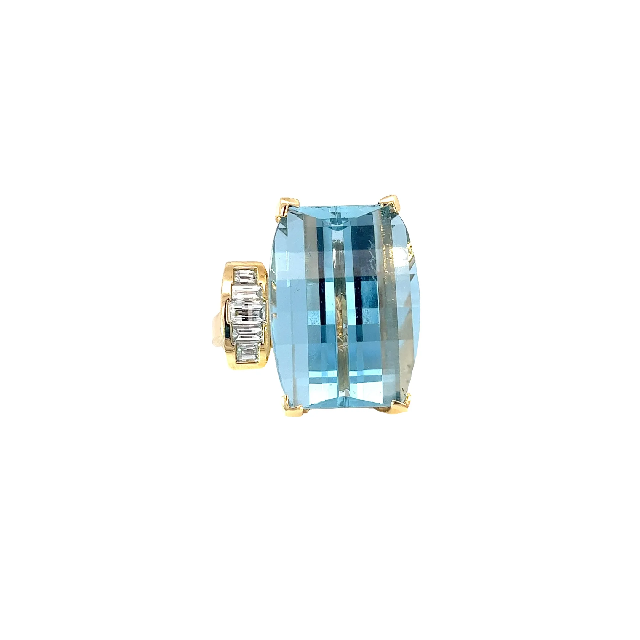14k Yellow Gold 38.00ct  Emerald Cut  Blue Topaz and .85ct G SI1 Baguette shaped Diamond ring
